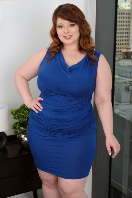 Redheaded BBW Bea York is stripped naked before sex on a bed 48002047